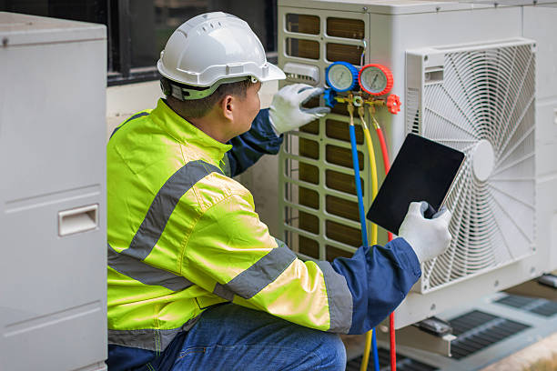 Professional Air Conditioning Repair technician working in Burkittsville, MD